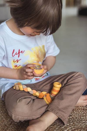 Drewniany kalejdoskop Pocket 2+, opakowanie zbiorcze 12 sztuk (3 rodzaje), Janod